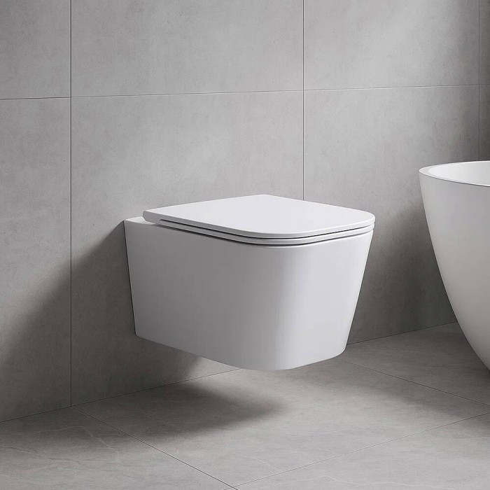 Унітаз підвісний Devit Fly 3050120 безобідковий з кришкою soft-close, білий глянець