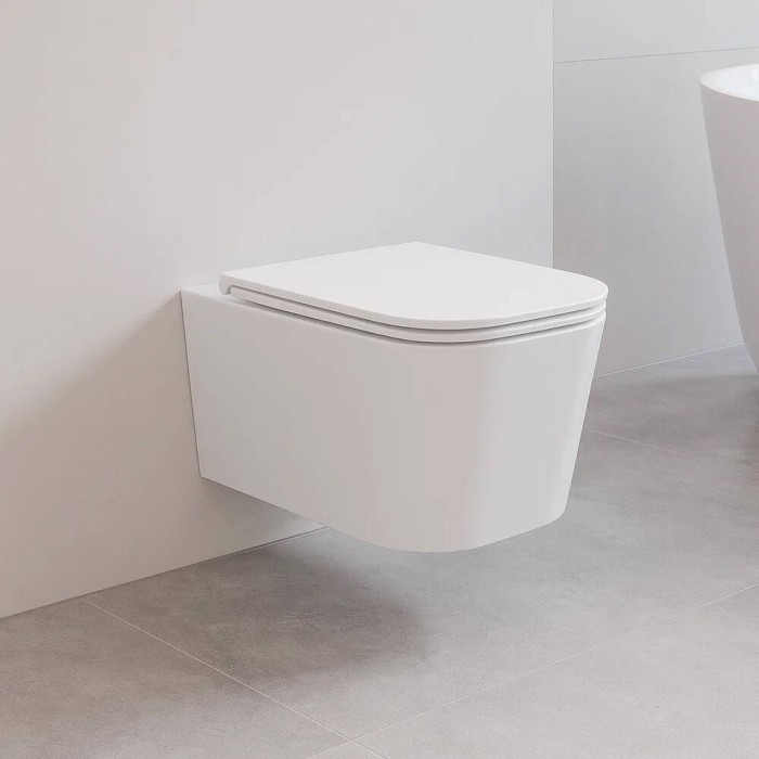 Унітаз підвісний Devit Fly 3050120 безобідковий з кришкою soft-close, білий глянець